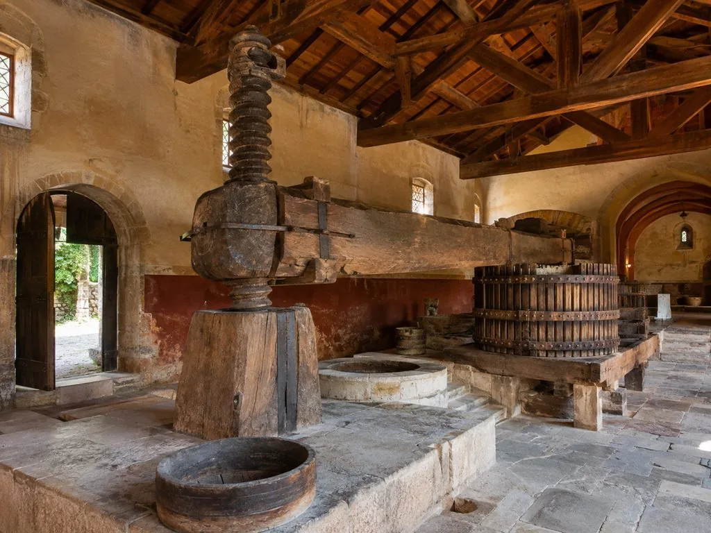 Eine der vier Spindelpressen in der Kelterei des Clos de Vougeot